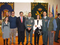 La imagen muestra la entrega de un premio a OHL